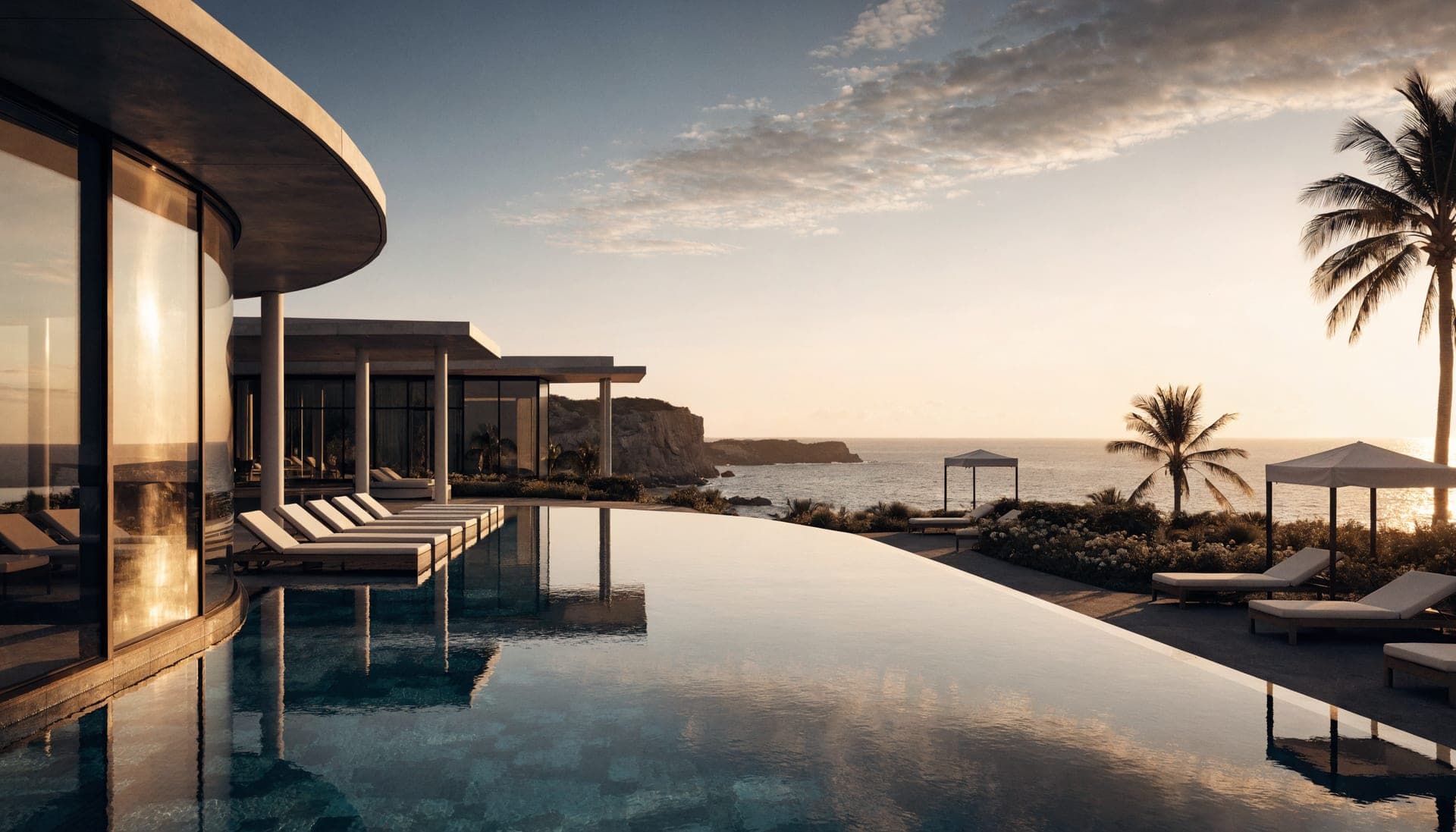 Infinity pool at a luxury coastal resort glowing at golden hour